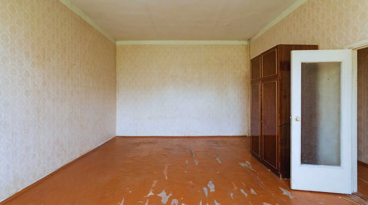 Bedroom two on the main residential floor, current condition