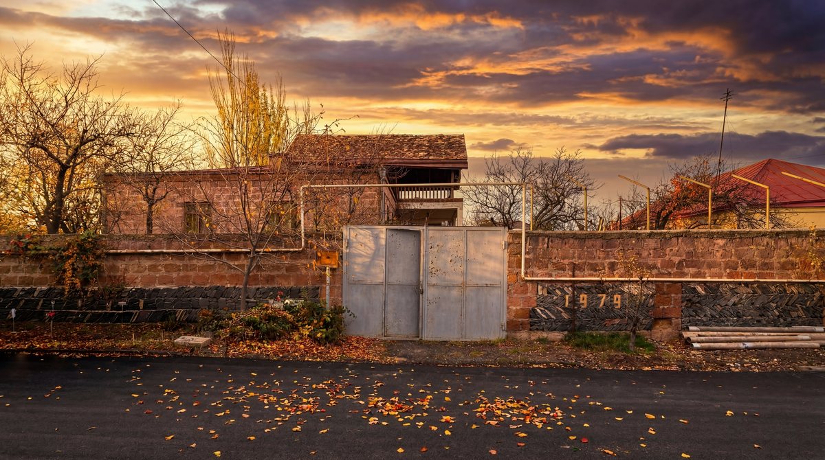 Street view of the property in autumn