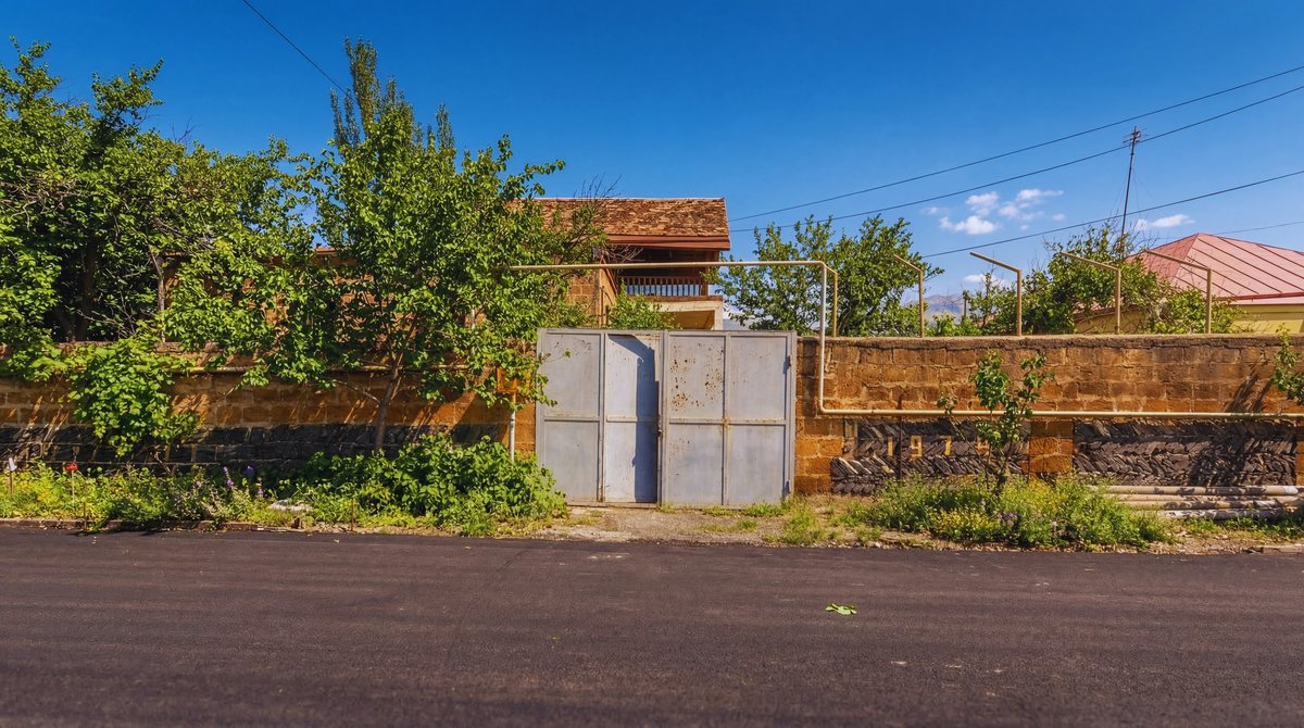 Street view of the property in summer
